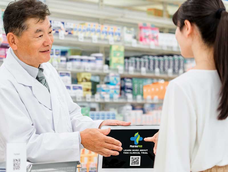 PharmaPAIR Product Demo. Pharmacist showing the product to a customer